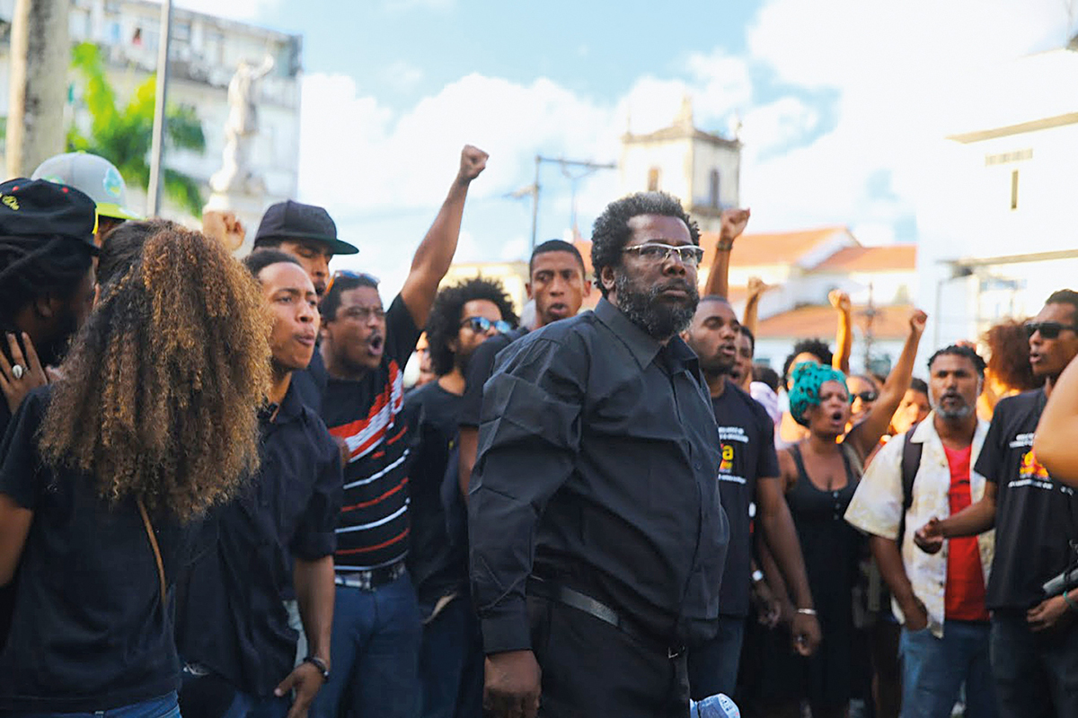 Hamilton Borges dos Santos of Reaja walks in the 2015 march against genocide in Salvador, Bahia. Photo: Lena Azevedo.