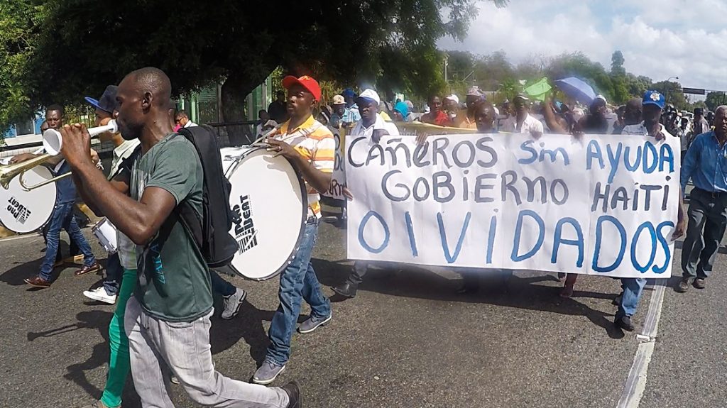 Sugarcane cutters protest outside the Haitian embassy in Santo Domingo on July 14, 2015, claiming they have been forgotten by Haiti. After living most of their lives in the Dominican Republic, many are now fighting to gain permanent residency there. Photo: Jheison Romain.